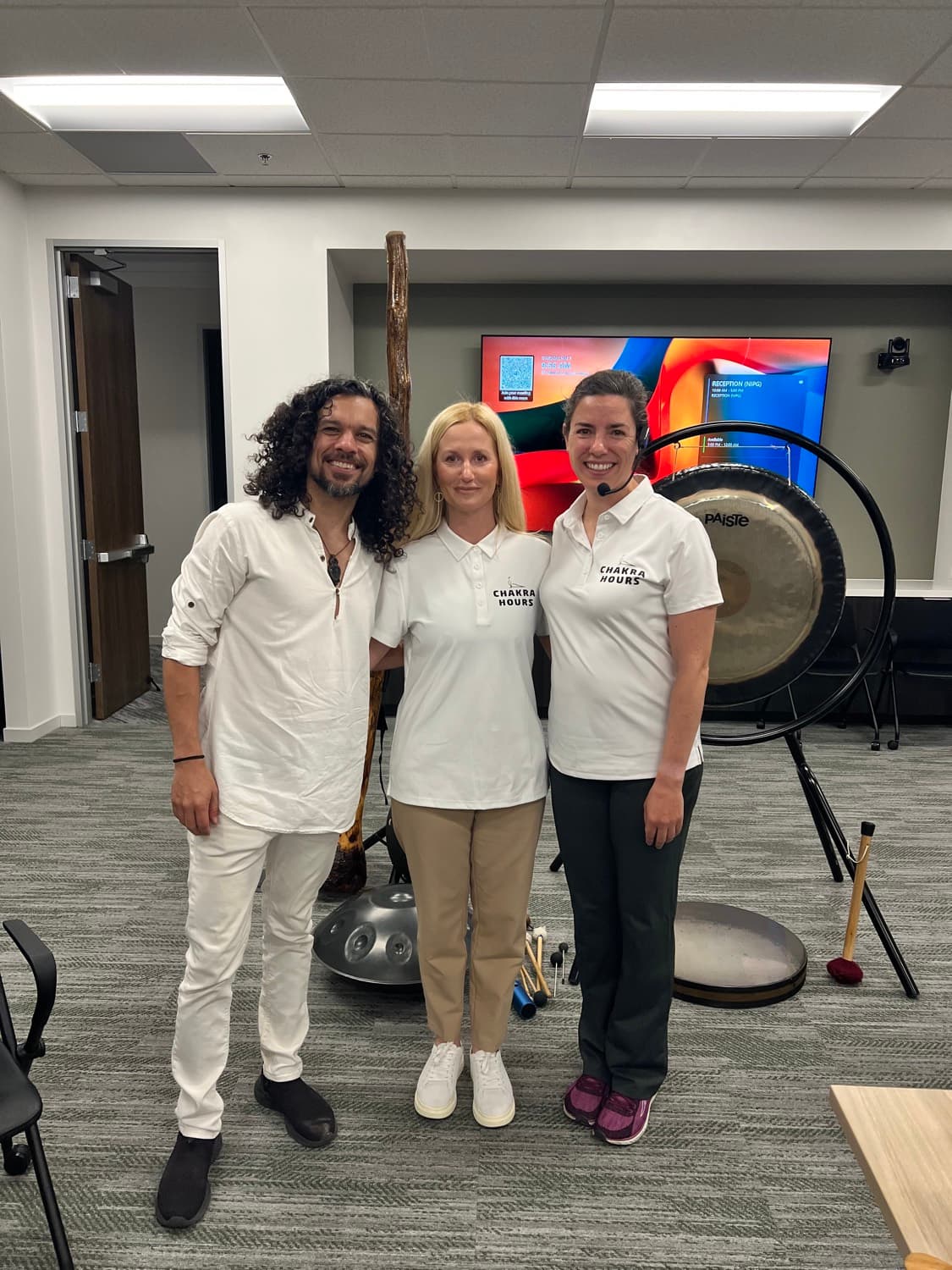 Chakra Hours certified facilitators in branded polos at a recent corporate onsite sound bath in Dallas