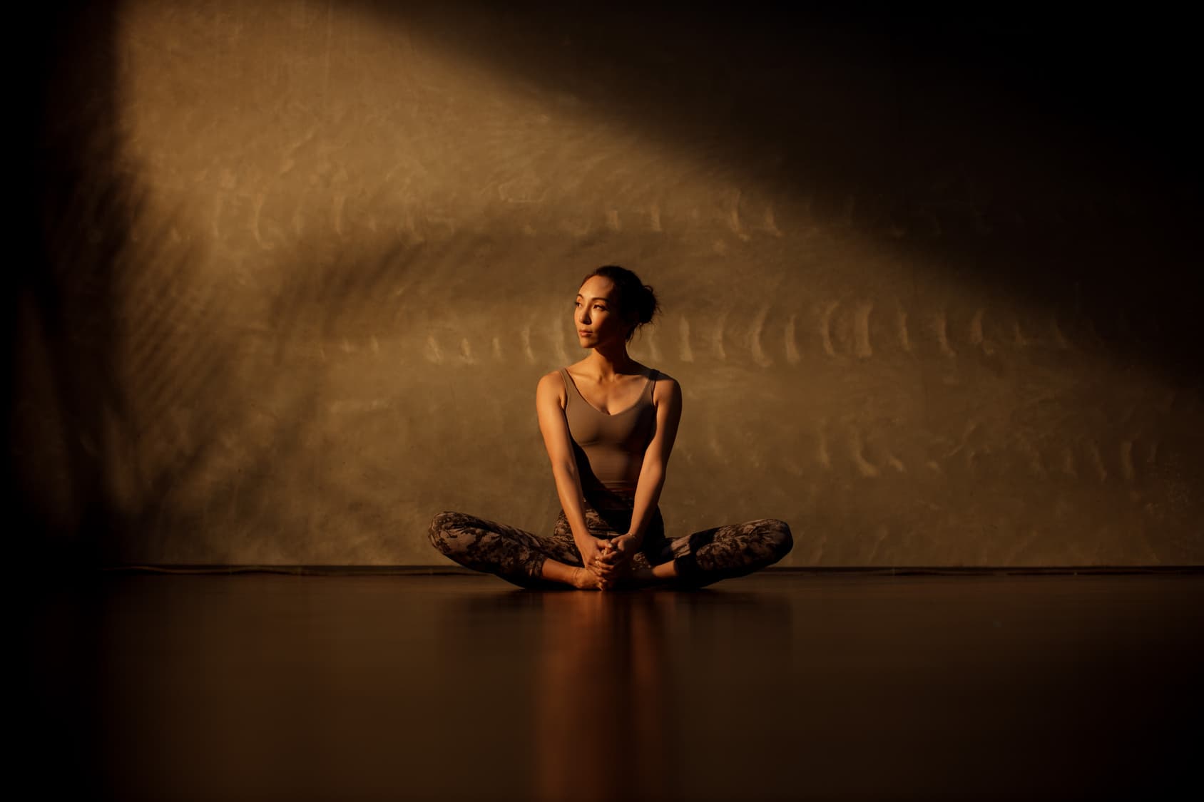 Onsite corporate yoga session for a Dallas team in an office conference room - corporate yoga Dallas pricing and logistics guide - Chakra Hours