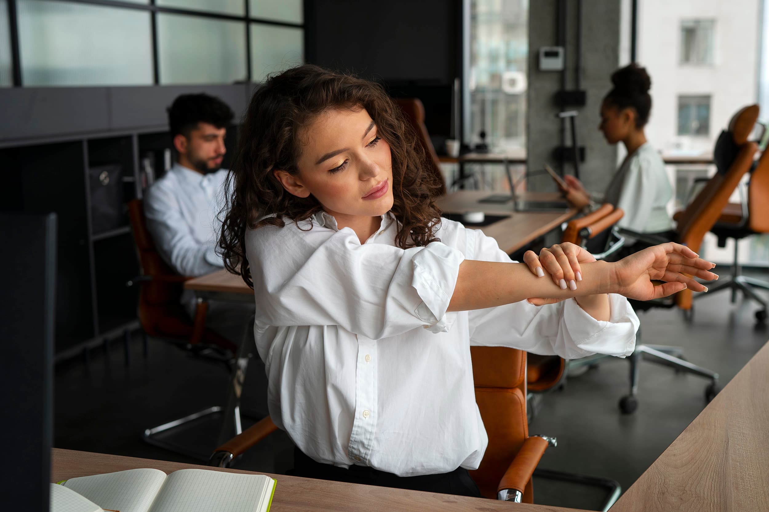 Employee at her desk, eyes closed in a guided breath practice - The Workday Reset Method in action - Chakra Hours